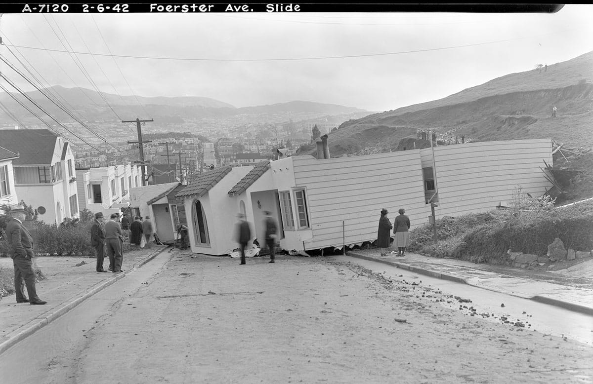 houses pushed into street by mudslide